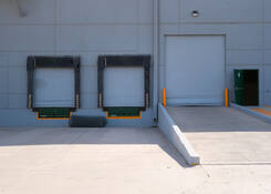 
                                	        JUA035: JUA035 Exterior. Dock doors and ramp
                                    